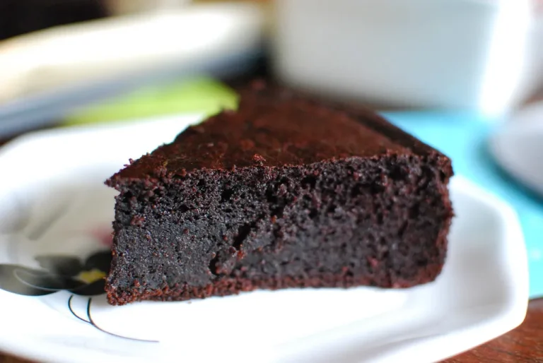 Gluten-free vanilla cake with layers of soft, fluffy cake and smooth vanilla frosting, made using gluten-free cake flour