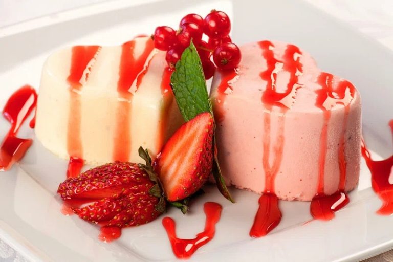 A stunning homemade gelato cake with vibrant layered gelato flavors, fresh fruit toppings, and elegant decorations.