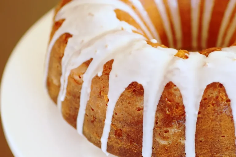 An elegantly frosted pound cake with a variety of delicious icing options, ideal for any occasion