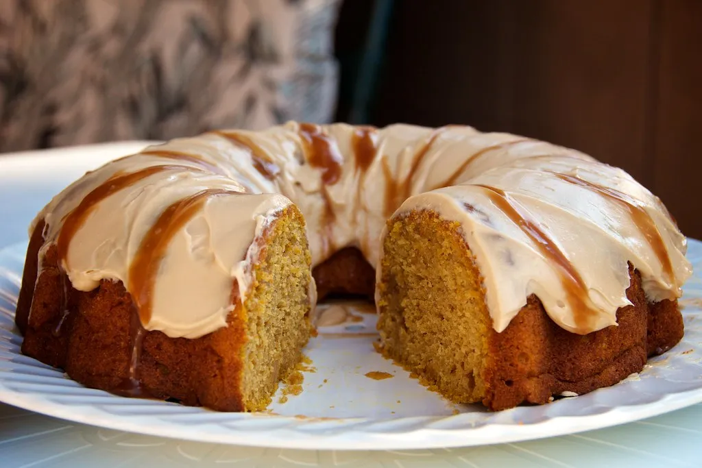 Delicious pound cake topped with smooth, homemade icing, showcasing a variety of icing recipes to enhance your baked goods.