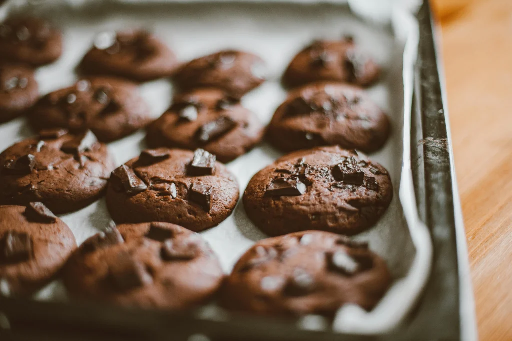 Close-up of Dirty Dough cookies with layered fillings and melted chocolate