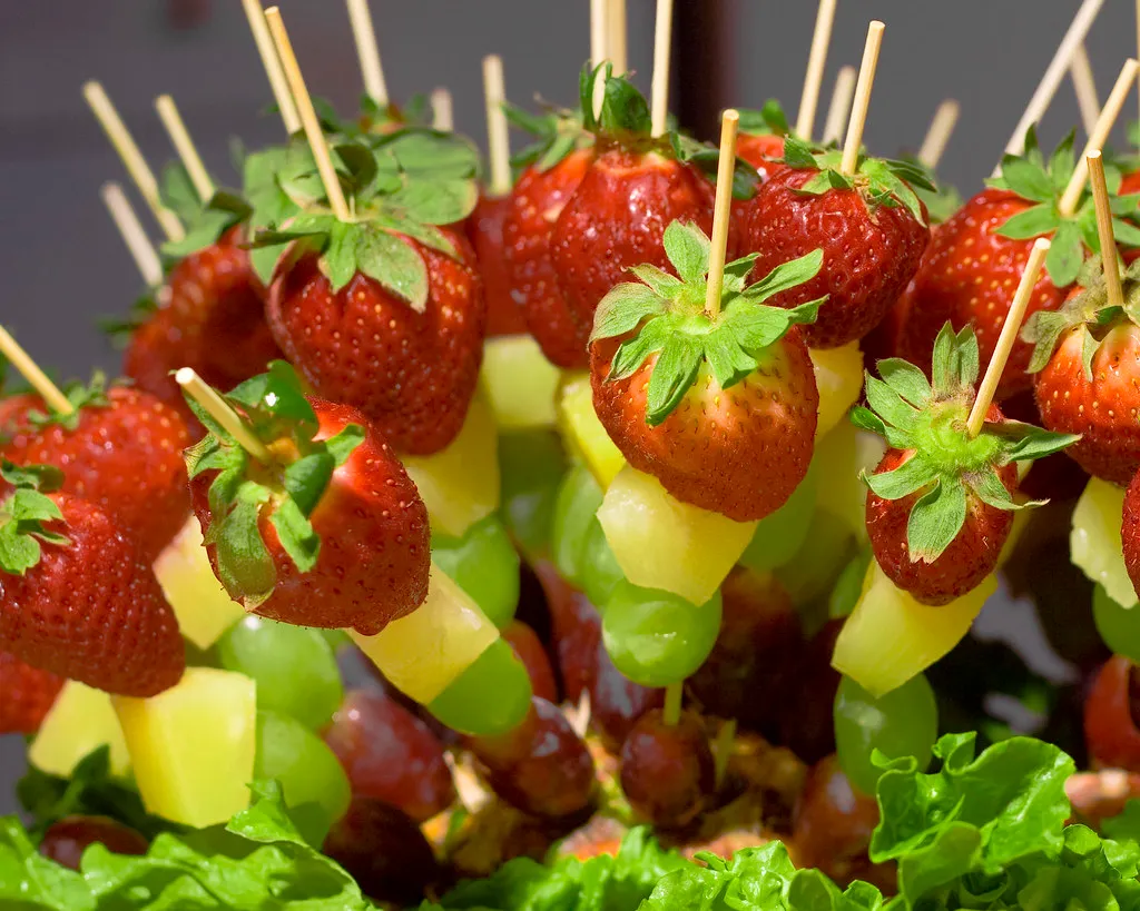 Colorful fruit skewers with strawberries, blueberries, and watermelon