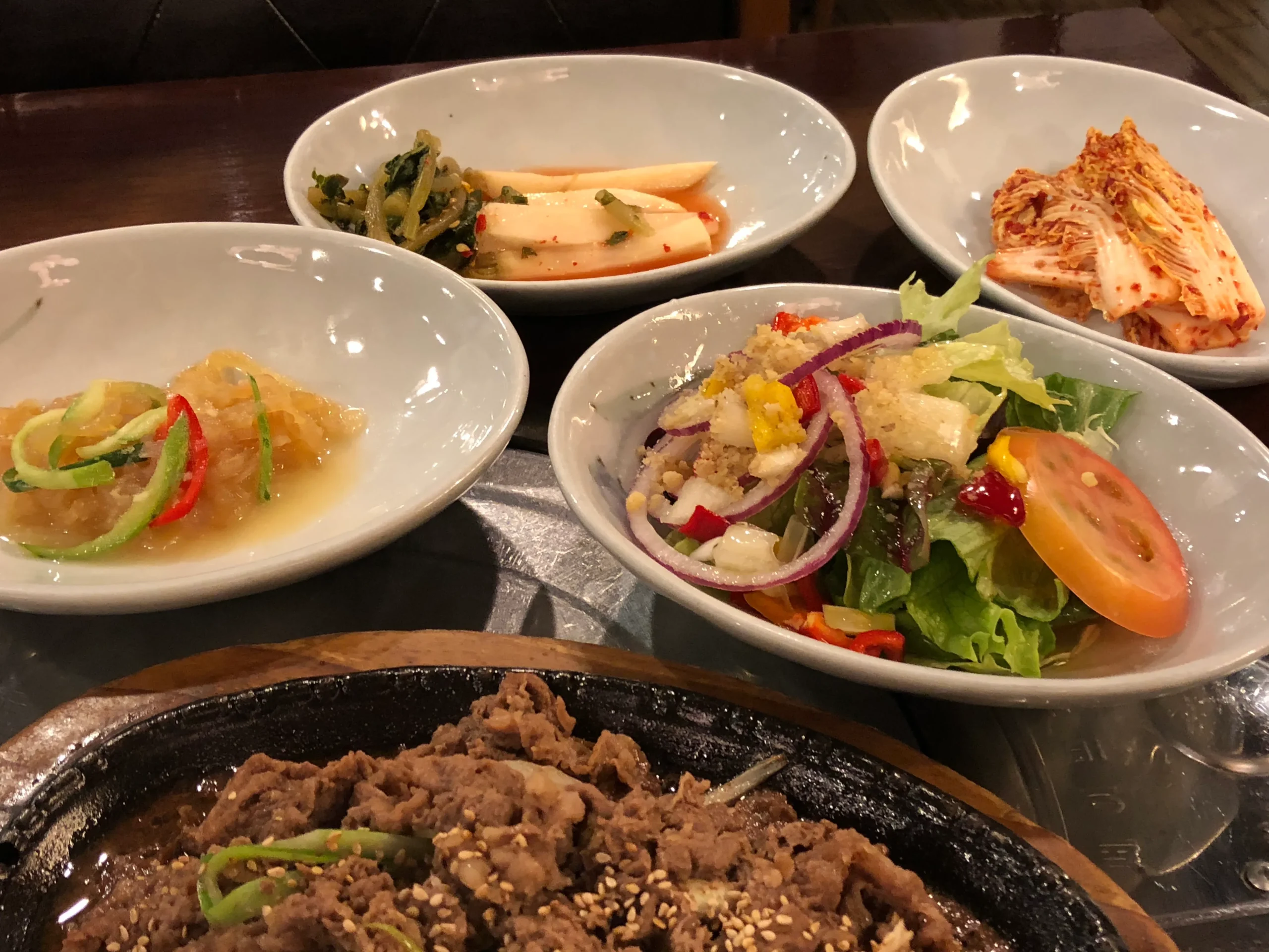 Colorful assortment of healthy side dishes including roasted vegetables, fresh salads, and nutritious whole grains
