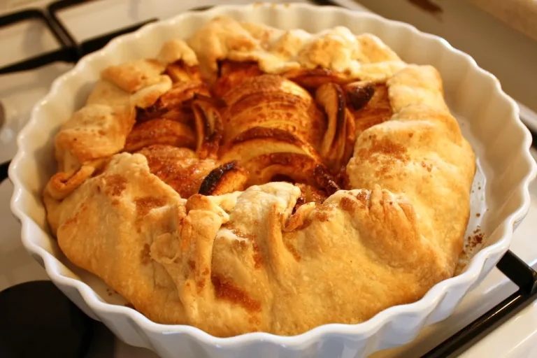 Rustic apple galette with golden flaky crust and spiced apple filling baked to perfection