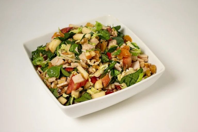 Healthy turkey salad served in a bowl with celery, grapes, and creamy dressing, perfect for a protein-packed meal