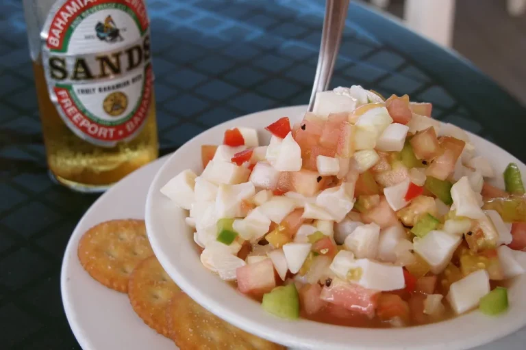 Colorful Caribbean conch salad recipe with diced vegetables and citrus marinade