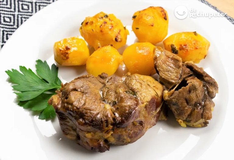 Delicious homemade Cuban beef and potato stew garnished with fresh cilantro, a traditional Latin comfort food recipe.