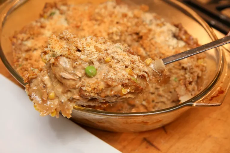 olden-baked Amish breakfast casserole with sausage, cheese, and crispy hash browns
