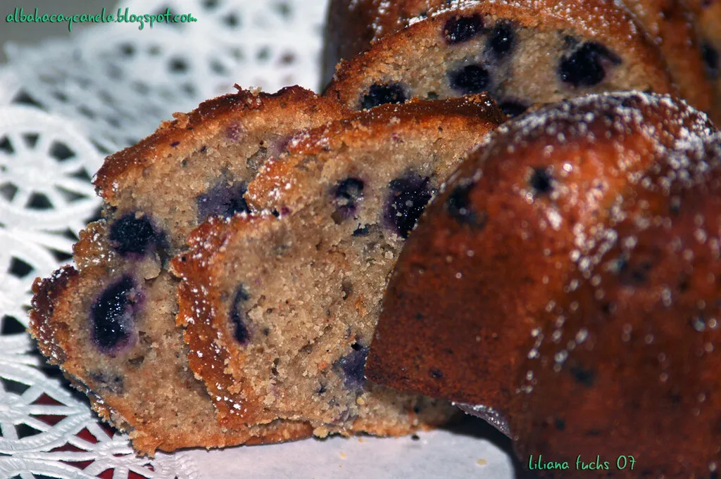 Freshly baked blueberry cake with golden crust and juicy blueberries on top